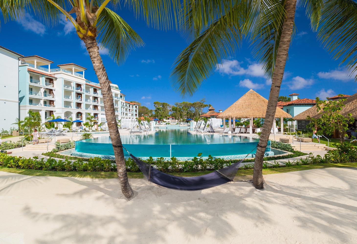 Experience the Royal Treatment at Sandals Royal Barbados, the all-new, all-suite all-inclusive in the spirited St. Lawrence Gap area. Featuring a number of Sandals firsts, including the first rooftop pool and bar, the first 4-lane bowling alley, Sandals first gourmet donut shop. This 338 all-suite all-inclusive resort in Barbados features Sandals signature accommodations, including the magnificent Skypool Suites, Swim-up Suites, and Millionaire Suites, world-class international cuisine at nine restaurants, and a 15,000-sq.-ft. spa. Stunning ocean views, Butler Elite service and exclusive exchange privileges with nearby Sandals Barbados define the new Luxury Included® experience at Sandals Royal Barbados.