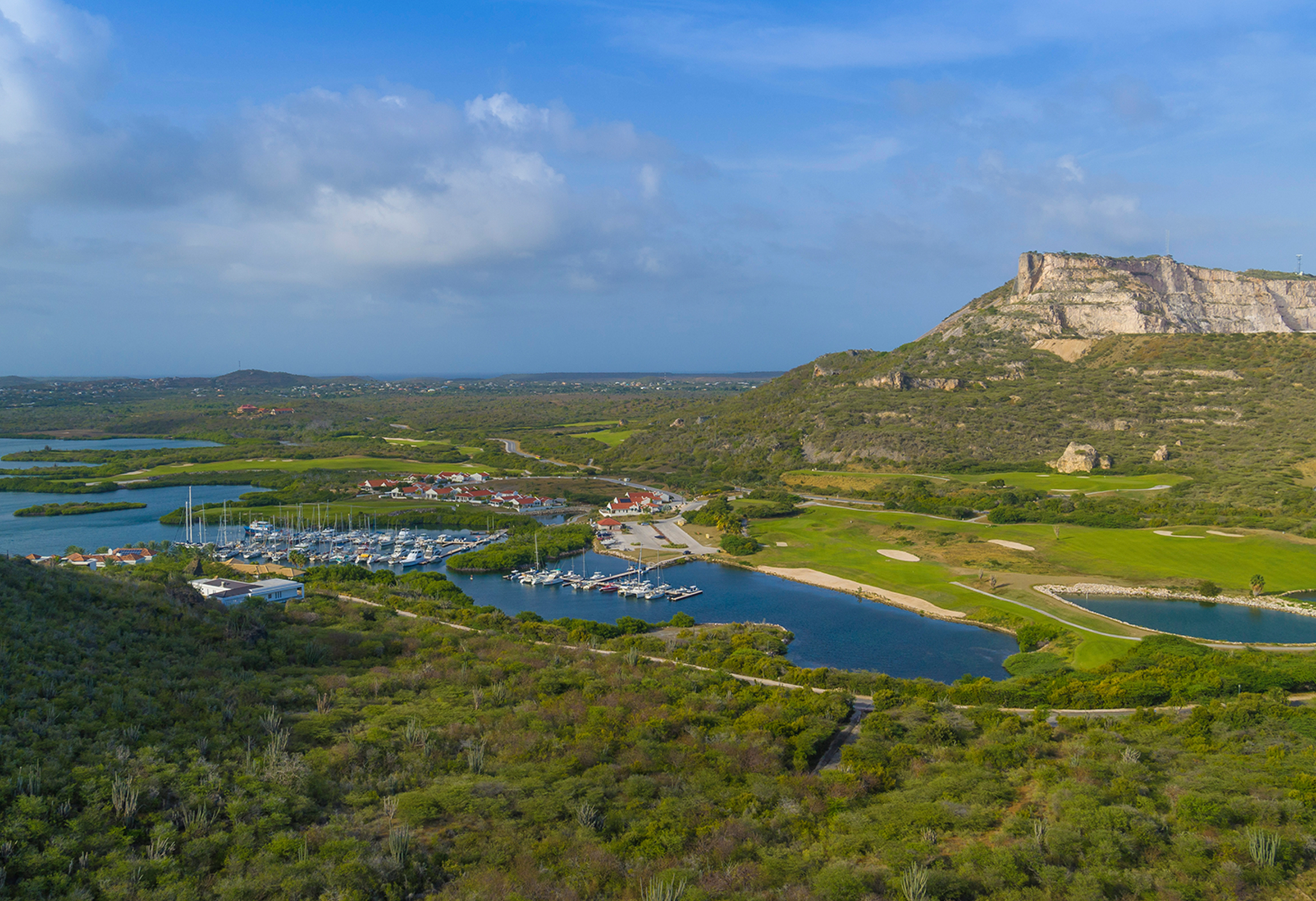 Nestled in the heart of the Leeward Antilles, on the coast of a tiny, beautiful island where natural and cultural wonders connect to create a beautiful mélange unseen anywhere else. Sandals newest all-inclusive resort in Curaçao is where the natural romance of our intimate island comes alive. You’ll see it in the line where the desert landscape gently slopes into the azure ocean. Waters that invite you to dive in and explore what’s beneath.